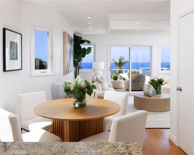 dining room featuring recessed lighting and wood finished floors