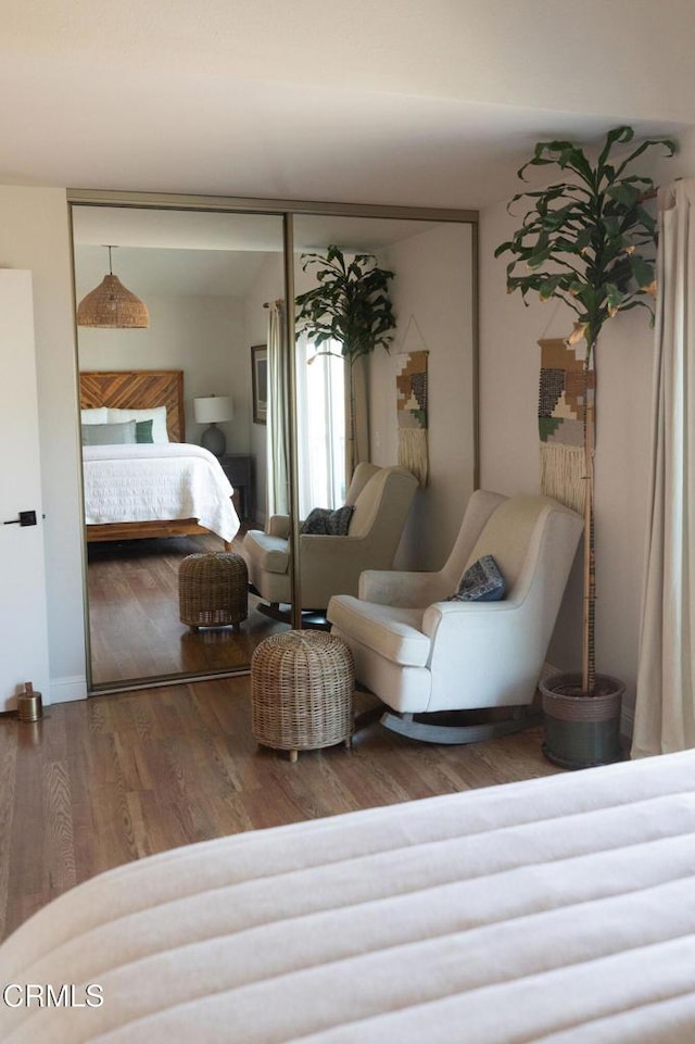 bedroom with wood finished floors