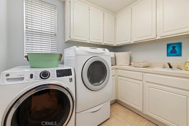 23480 Canterbury Way, Murrieta, CA 92562 - laundry room with washer and dryer, cabinet space, and light tile patterned floors