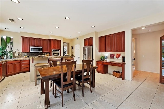 23480 Canterbury Way, Murrieta, CA 92562 - dining room with light tile patterned floors and recessed lighting