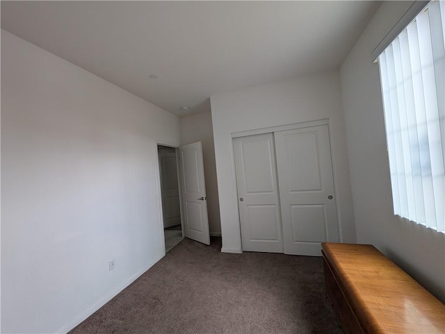 1617 Sinton Ct, Beaumont, CA 92223 - unfurnished bedroom featuring carpet, a closet, and baseboards