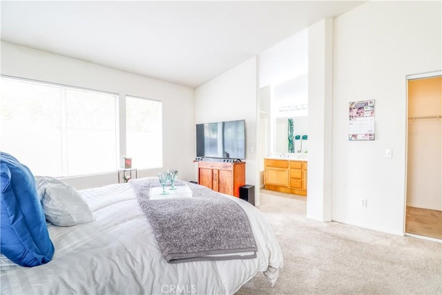 831 Kilmarnock Way, Riverside, CA 92508 - bedroom with vaulted ceiling, light carpet, a spacious closet, and ensuite bathroom