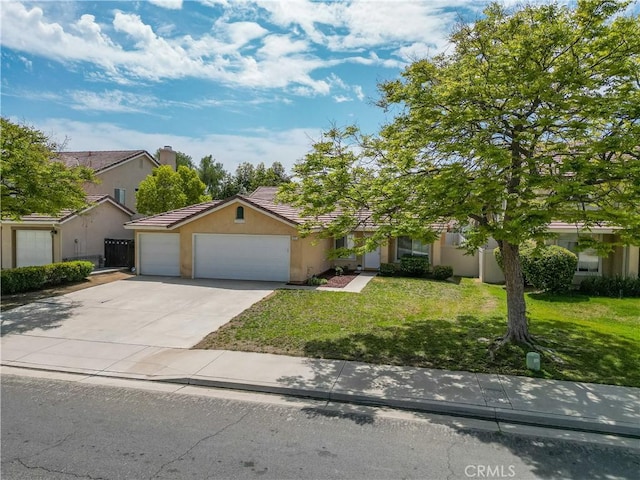 831 Kilmarnock Way, Riverside, CA 92508 - view of front facade featuring an attached garage, driveway, stucco siding, a front yard, and a tiled roof