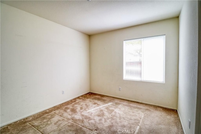 831 Kilmarnock Way, Riverside, CA 92508 - carpeted empty room with baseboards