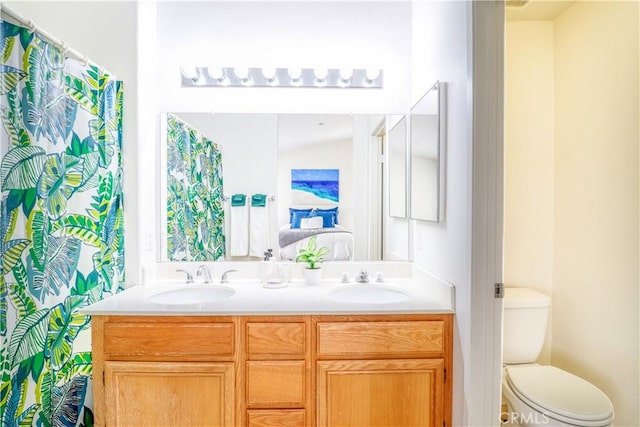 831 Kilmarnock Way, Riverside, CA 92508 - full bathroom featuring toilet, double vanity, and a sink