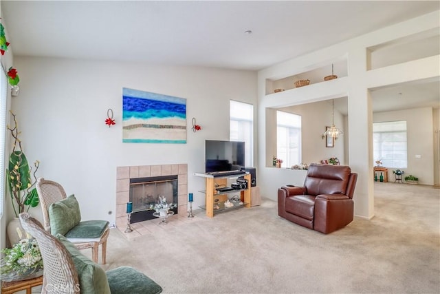 831 Kilmarnock Way, Riverside, CA 92508 - living room with carpet flooring and a tiled fireplace