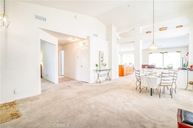 831 Kilmarnock Way, Riverside, CA 92508 - dining area featuring carpet, high vaulted ceiling, and visible vents