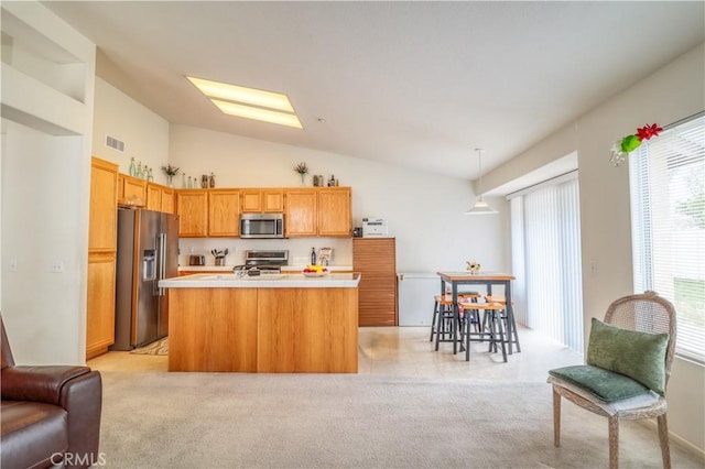 831 Kilmarnock Way, Riverside, CA 92508 - kitchen featuring stainless steel appliances, visible vents, open floor plan, light carpet, and light countertops