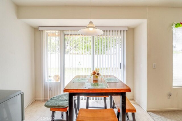 831 Kilmarnock Way, Riverside, CA 92508 - dining area featuring baseboards, light tile patterned flooring, and plenty of natural light
