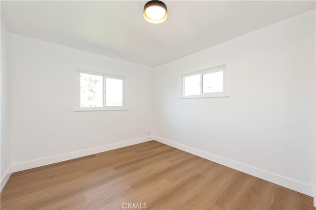 781 E Navilla Pl, Covina, CA 91723 - unfurnished room featuring light wood-style flooring, baseboards, and a healthy amount of sunlight
