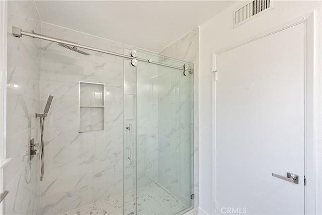 781 E Navilla Pl, Covina, CA 91723 - bathroom with a marble finish shower and visible vents