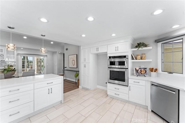 17841 Buena Vista Ave, Yorba Linda, CA 92886 - kitchen featuring appliances with stainless steel finishes, open shelves, light countertops, white cabinetry, and recessed lighting