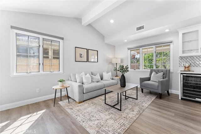 17841 Buena Vista Ave, Yorba Linda, CA 92886 - living area featuring beverage cooler, light wood finished floors, recessed lighting, and bar