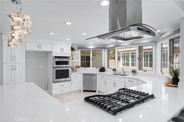 17841 Buena Vista Ave, Yorba Linda, CA 92886 - kitchen featuring open shelves, a sink, island range hood, white cabinetry, and appliances with stainless steel finishes