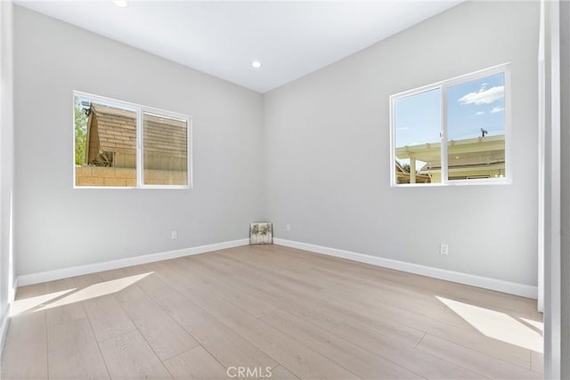 17841 Buena Vista Ave, Yorba Linda, CA 92886 - empty room with plenty of natural light, wood finished floors, and recessed lighting