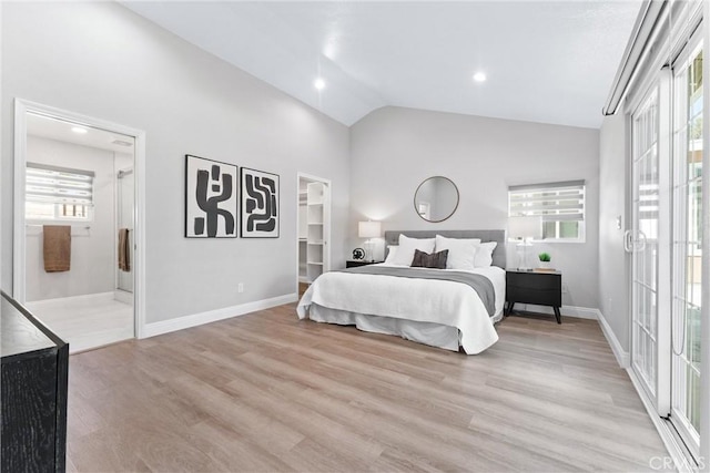 17841 Buena Vista Ave, Yorba Linda, CA 92886 - bedroom featuring multiple windows, light wood-style flooring, and vaulted ceiling