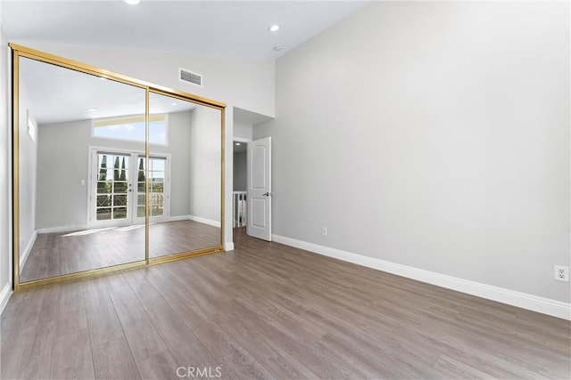 17841 Buena Vista Ave, Yorba Linda, CA 92886 - unfurnished bedroom with wood finished floors, recessed lighting, a closet, and high vaulted ceiling