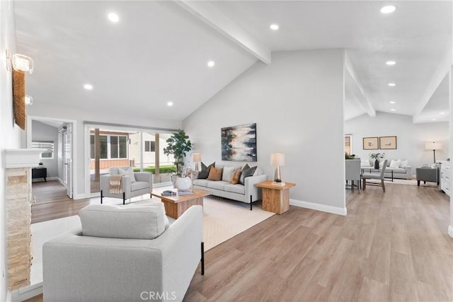 17841 Buena Vista Ave, Yorba Linda, CA 92886 - living room with light wood finished floors, baseboards, vaulted ceiling with beams, and recessed lighting