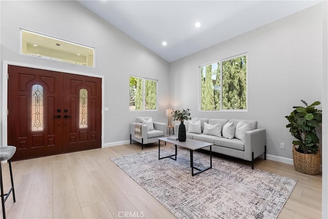 17841 Buena Vista Ave, Yorba Linda, CA 92886 - living room featuring light wood finished floors, high vaulted ceiling, and recessed lighting
