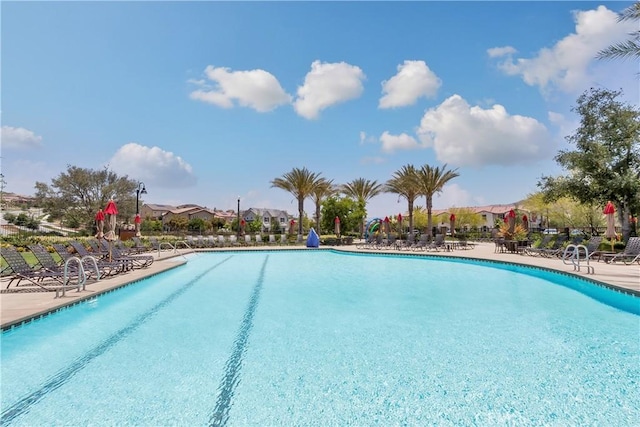 community pool featuring a patio area