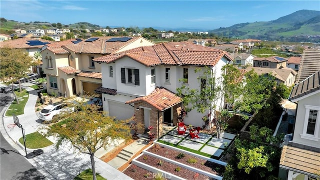 exterior space featuring a mountain view and a residential view