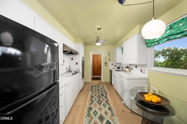 675 Mount Wilson Trl, Sierra Madre, CA 91024 - laundry room featuring light wood-style floors and a sink