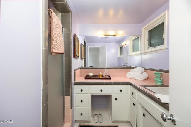 675 Mount Wilson Trl, Sierra Madre, CA 91024 - bathroom with double vanity, a shower with shower door, and backsplash