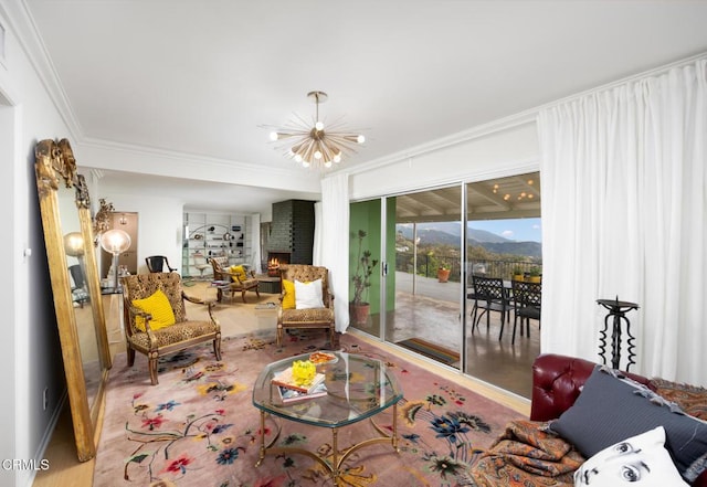 675 Mount Wilson Trl, Sierra Madre, CA 91024 - living area with a chandelier, crown molding, a fireplace, a mountain view, and wood finished floors