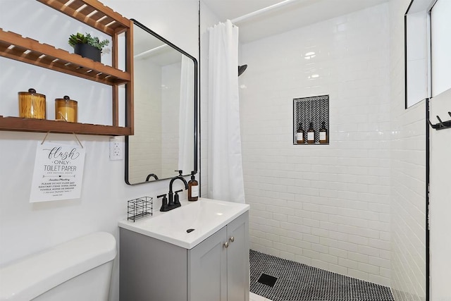 331 W Sherwood Blvd, Big Bear City, CA 92314 - bathroom with toilet, vanity, and tiled shower