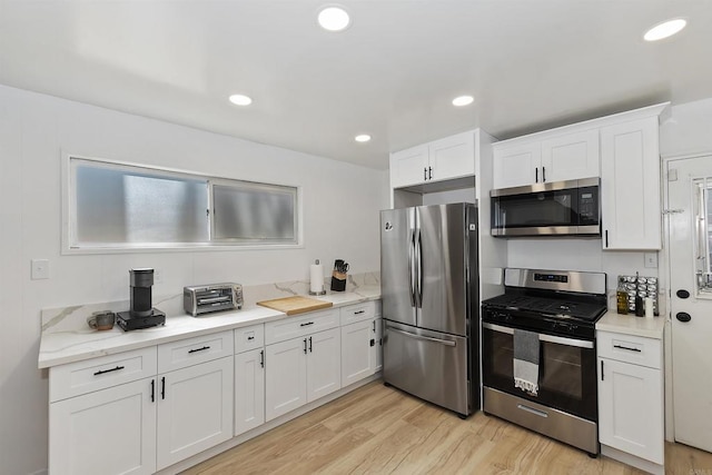 331 W Sherwood Blvd, Big Bear City, CA 92314 - kitchen featuring white cabinetry, light wood-style flooring, stainless steel appliances, and recessed lighting