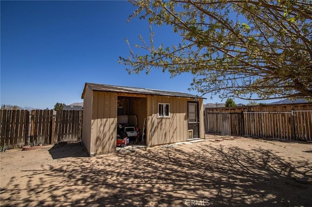 7469 Madera Ave, Hesperia, CA 92345 - view of shed featuring a fenced backyard
