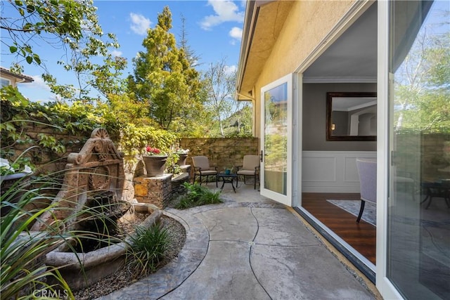 view of patio with fence