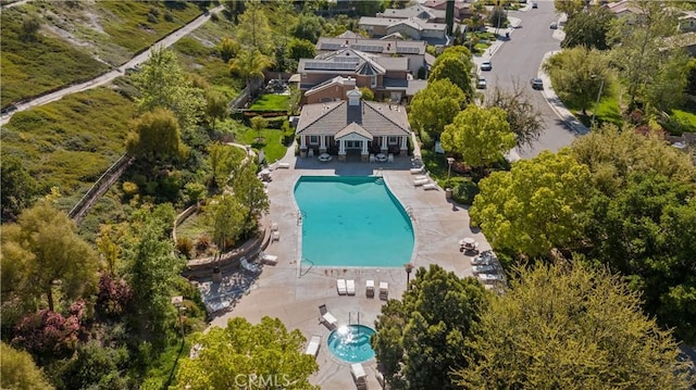 aerial overview of property's location featuring a pool area