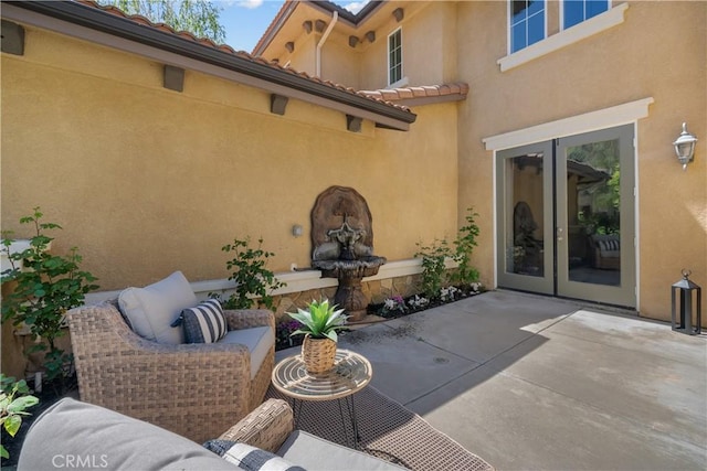 view of patio featuring french doors