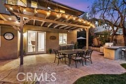 view of patio featuring outdoor dining area