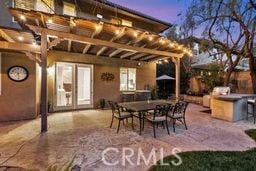 view of patio featuring outdoor dining area