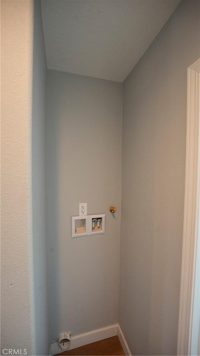 14610 Appleton St, Hesperia, CA 92345 - washroom featuring washer hookup, baseboards, and wood finished floors