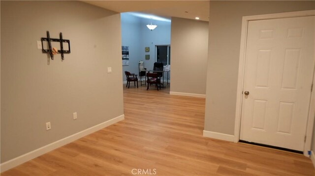 14610 Appleton St, Hesperia, CA 92345 - corridor featuring baseboards, light wood-style flooring, and recessed lighting
