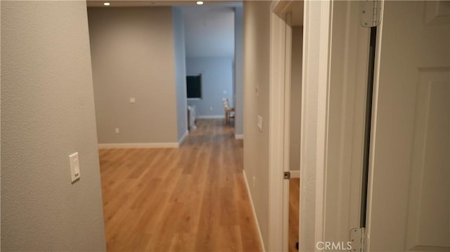 14610 Appleton St, Hesperia, CA 92345 - hall featuring light wood-style flooring, baseboards, and recessed lighting