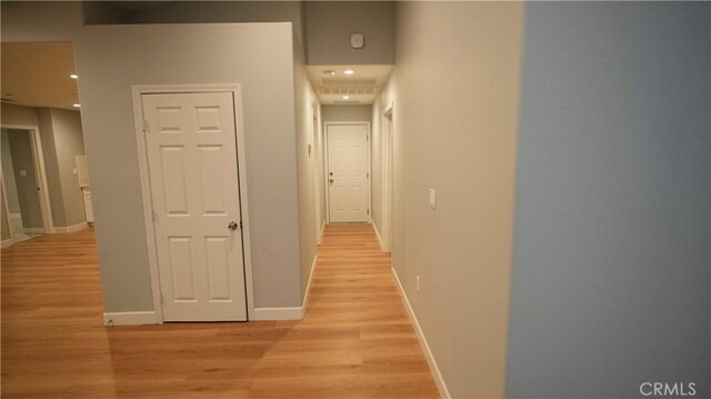 14610 Appleton St, Hesperia, CA 92345 - hall featuring light wood-style flooring, baseboards, and recessed lighting