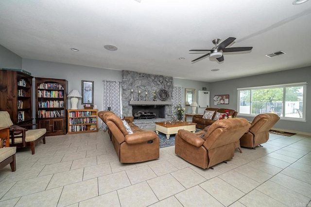 3567 Boussock Ln, Oceanside, CA 92057 - living area with visible vents, light tile patterned flooring, a stone fireplace, recessed lighting, and a ceiling fan