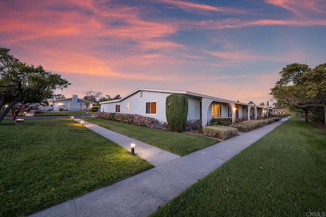 3567 Boussock Ln, Oceanside, CA 92057 - view of front facade with a lawn and stucco siding