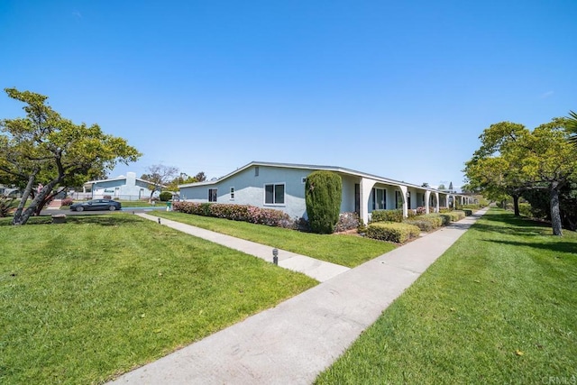 3567 Boussock Ln, Oceanside, CA 92057 - view of front of property featuring a front lawn and stucco siding