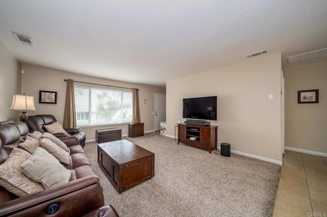 3567 Boussock Ln, Oceanside, CA 92057 - living area featuring visible vents, a textured ceiling, baseboards, and light tile patterned flooring