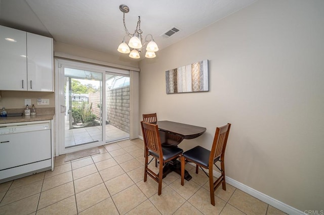 3567 Boussock Ln, Oceanside, CA 92057 - dining space featuring baseboards, an inviting chandelier, light tile patterned floors, and visible vents