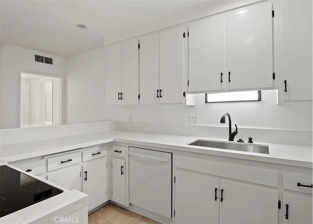 1250 S Beverly Glen Blvd Unit 205, Los Angeles, CA 90024 - kitchen featuring dishwasher, a sink, white cabinets, and light countertops