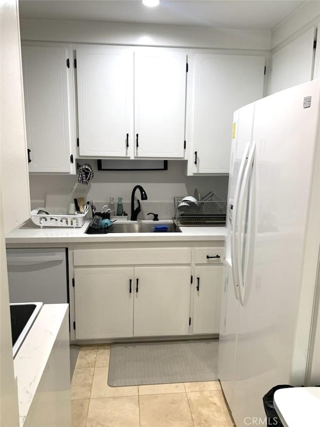 1250 S Beverly Glen Blvd Unit 205, Los Angeles, CA 90024 - kitchen with white appliances, a sink, white cabinets, light countertops, and recessed lighting