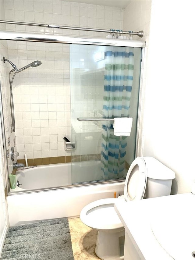 1250 S Beverly Glen Blvd Unit 205, Los Angeles, CA 90024 - bathroom with toilet, vanity, and shower / bath combination with glass door