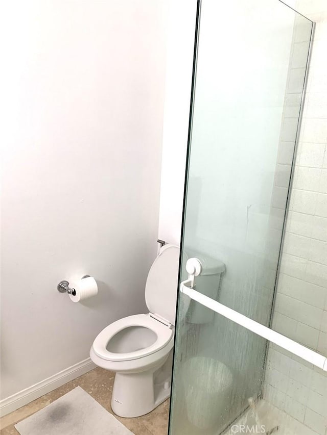 1250 S Beverly Glen Blvd Unit 205, Los Angeles, CA 90024 - full bath featuring toilet, baseboards, tile patterned floors, and a tile shower