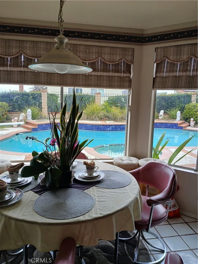 11537 Moonridge Dr, Whittier, CA 90601 - tiled dining room with healthy amount of natural light